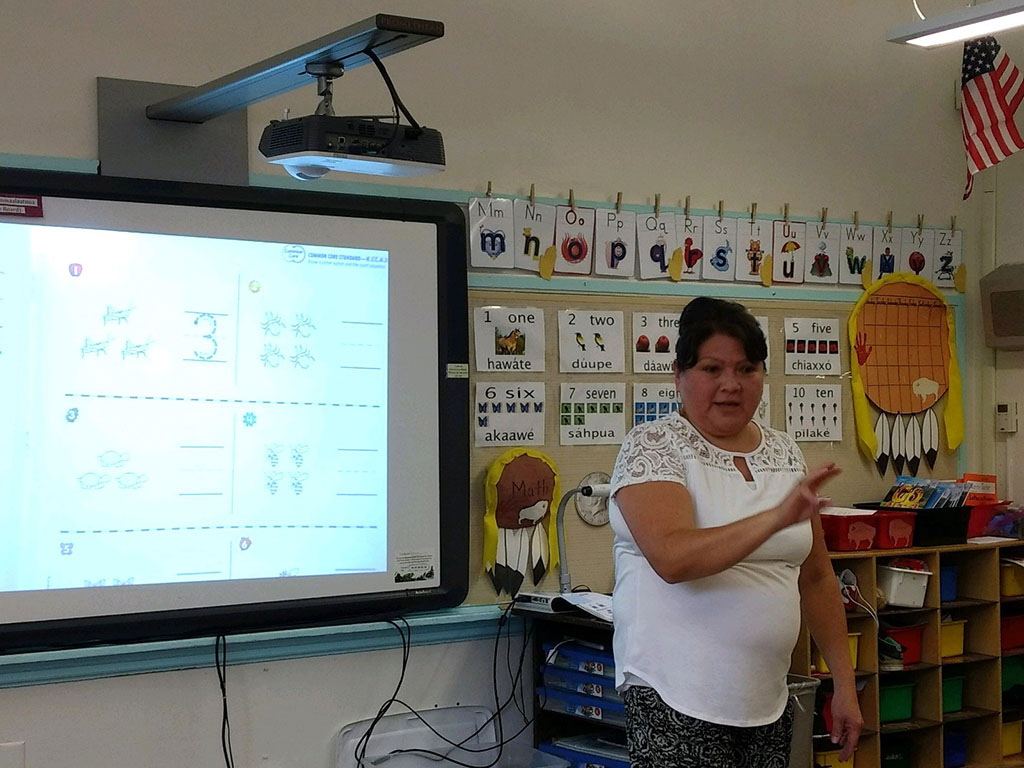 A Crow Agency Elementary teacher counts with students in the Crow language.
